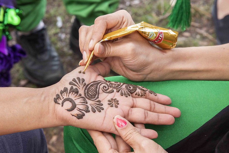 Mehndi is the Indian henna tattoo that is applied to the hands. This is a temporary tattoo that plays varied roles in Indian culture. After henna is applied and dries off, it leaves an ornate, brownish orange design which will stay on for a few days. 